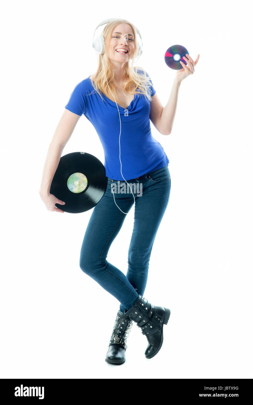 blonde girl holds a record and a cd Stock Photo