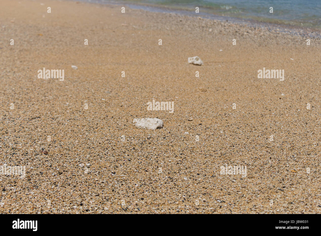 Sand Kies am meer als Nahaufnahme als Hintergrund Stock Photo