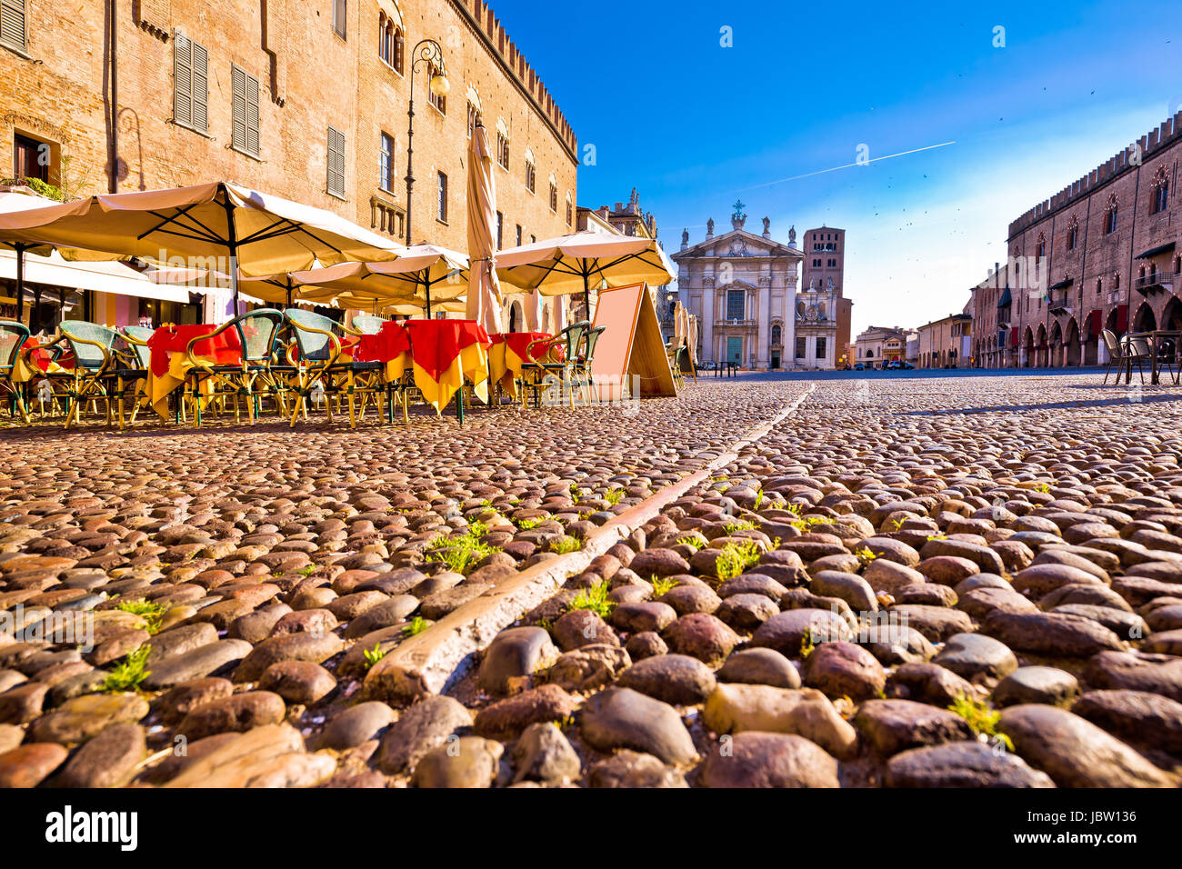Mantova city paved Piazza Sordello and idyllic cafe view, European capital of culture and UNESCO world heritage site, Lombardy region of Italy Stock Photo