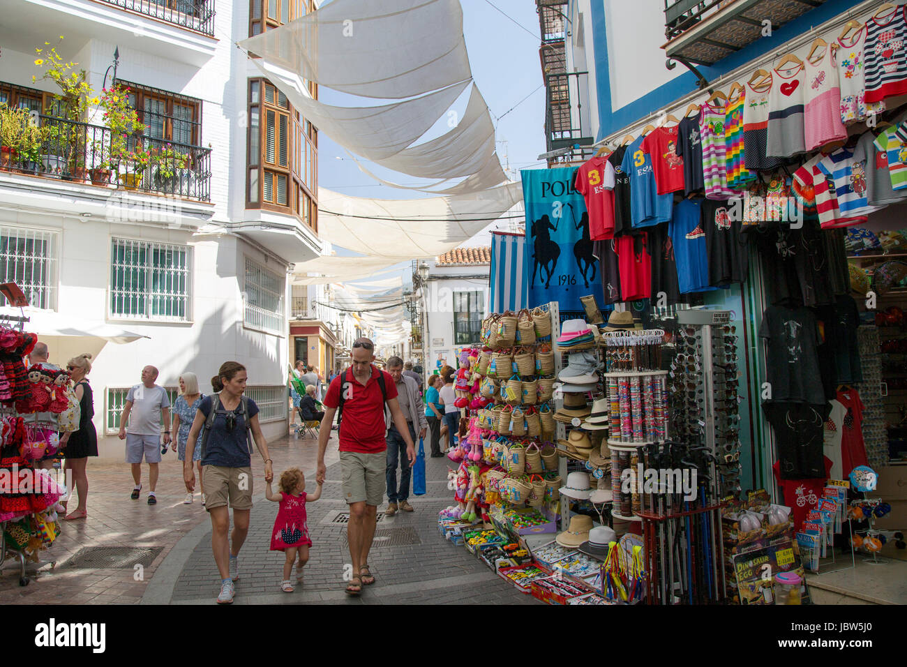 Shops and shoppers on Calle Pintada, Nerja, Andalusia, Spain, Costa del