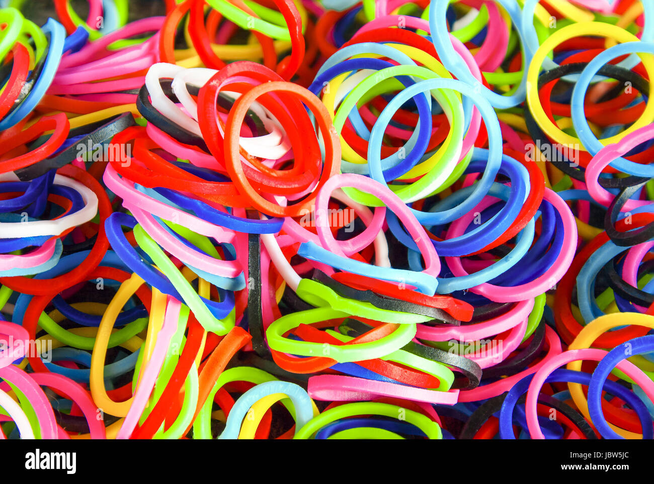 Colorful background Rainbow loom rubber bands fashion Stock Photo - Alamy