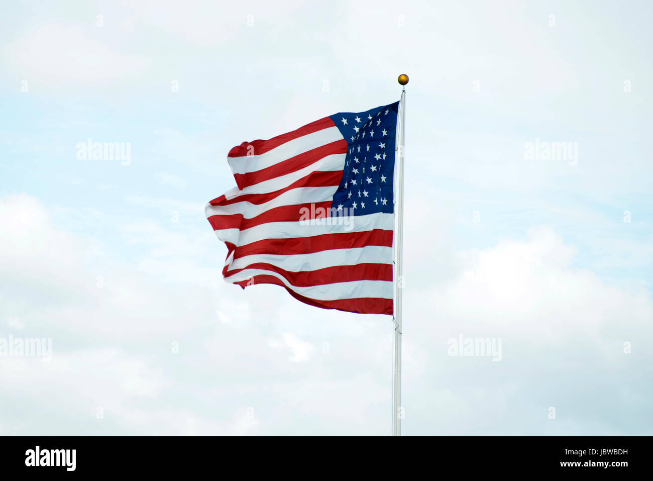 US flag against blue sky American Flag Stock Photo - Alamy