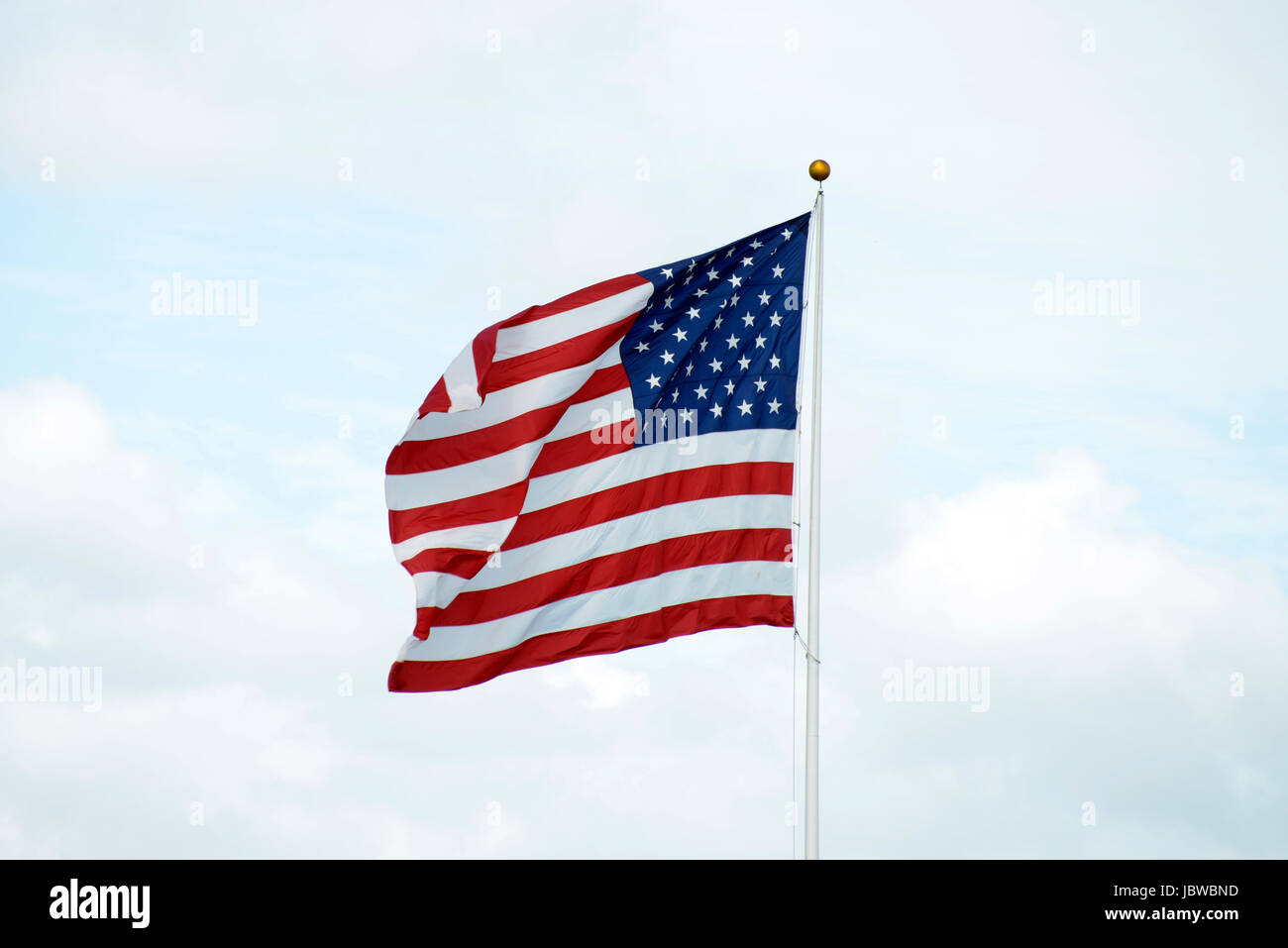 US flag against blue sky American Flag Stock Photo - Alamy
