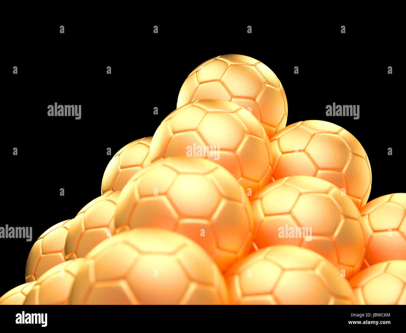 Close up of a pyramid made out of golden soccer balls on black background symbol for success and triumph Stock Photo