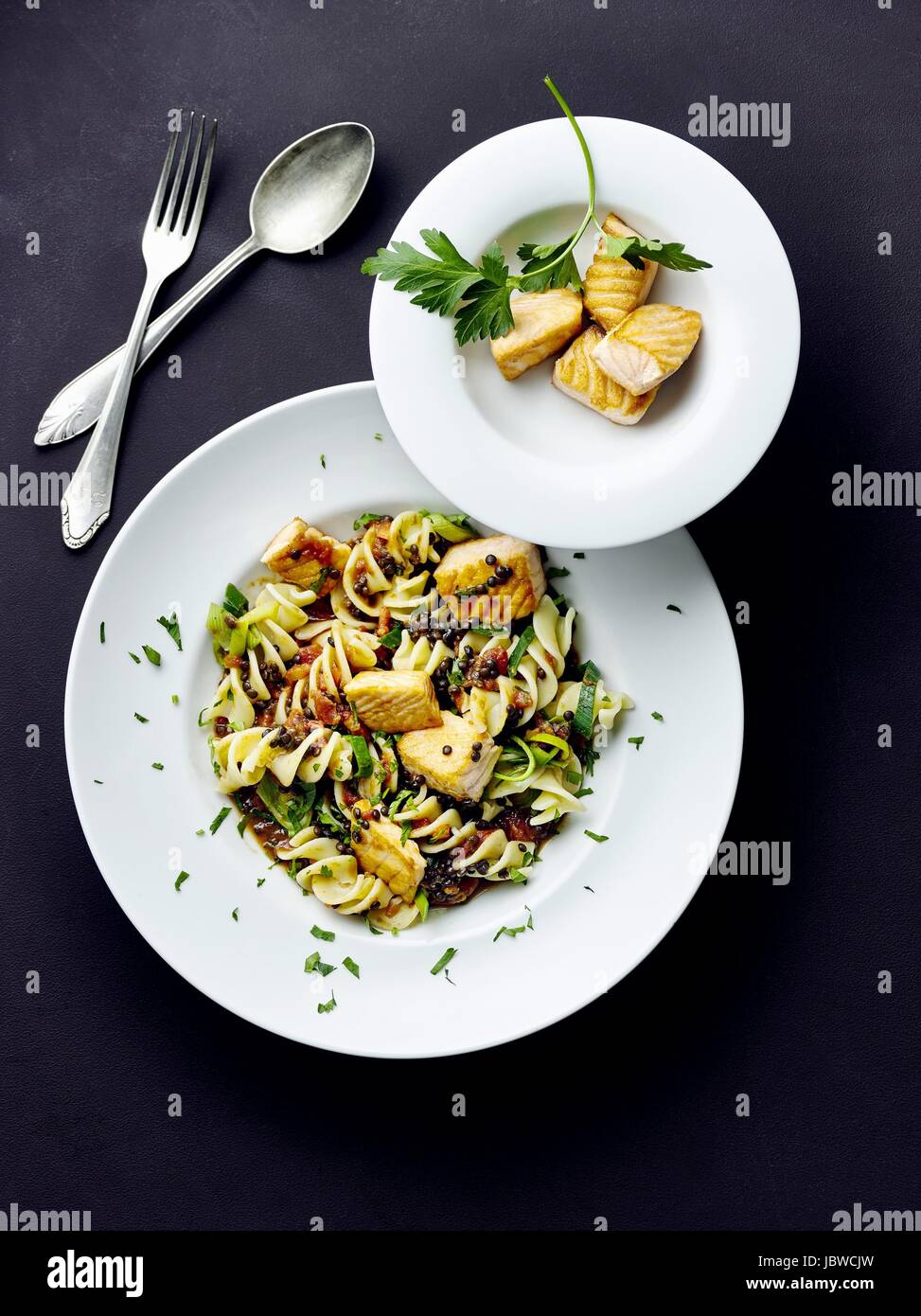 Pasta with lentils and salmon Stock Photo Alamy