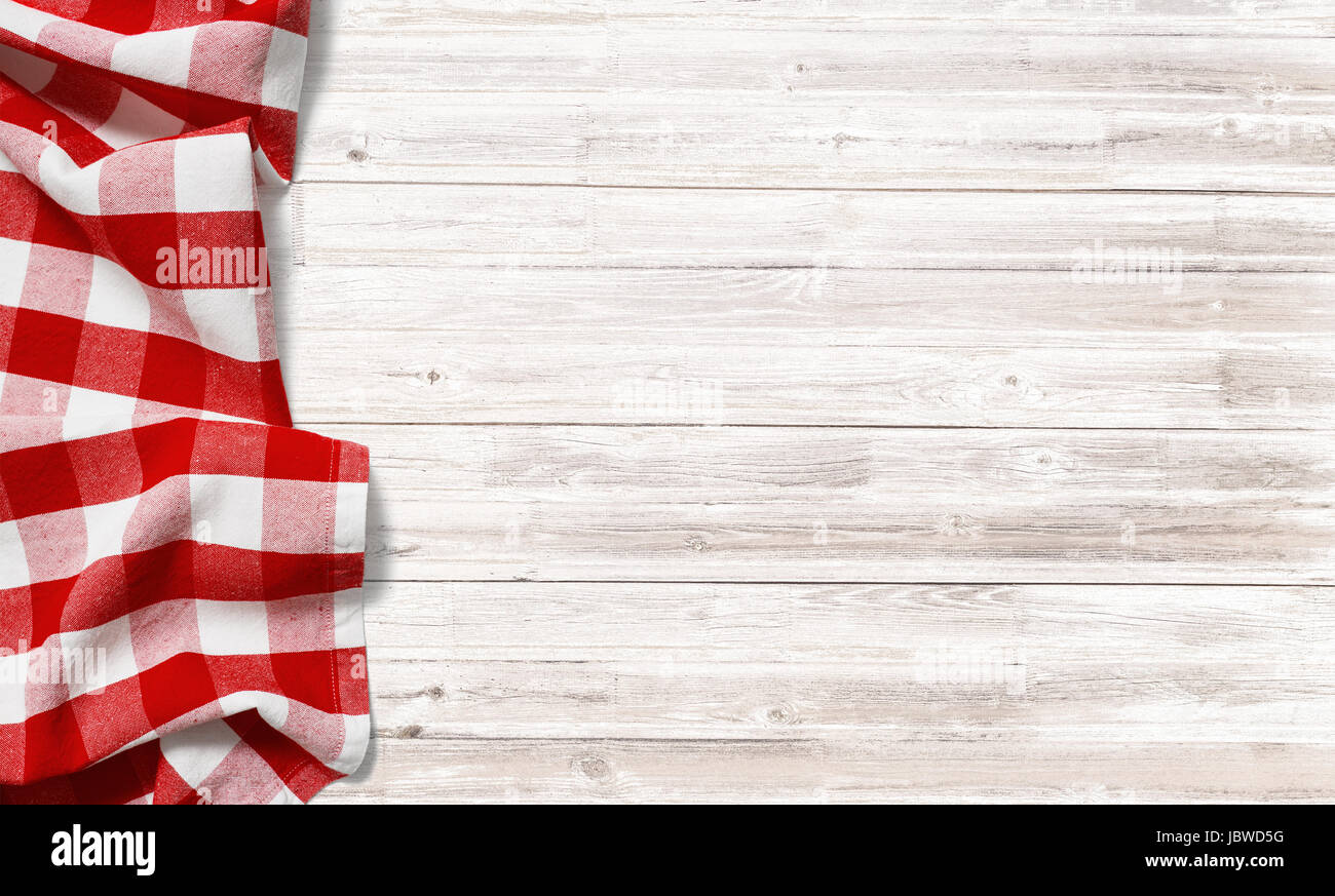 red checkered picnic tablecloth on white wood table Stock Photo Alamy
