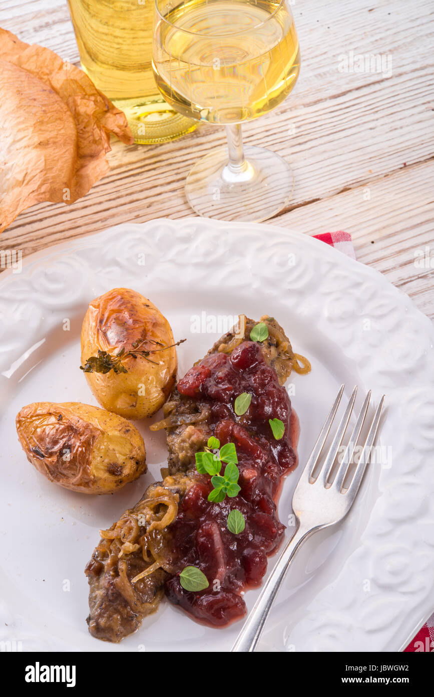 roasted liver with bake potato Stock Photo Alamy