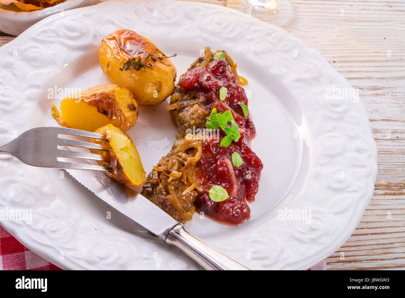 roasted liver with bake potato Stock Photo Alamy