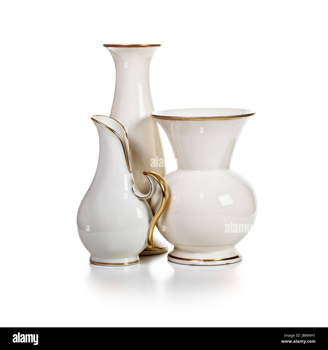 Three antique white porcelain vases on white background clipping path