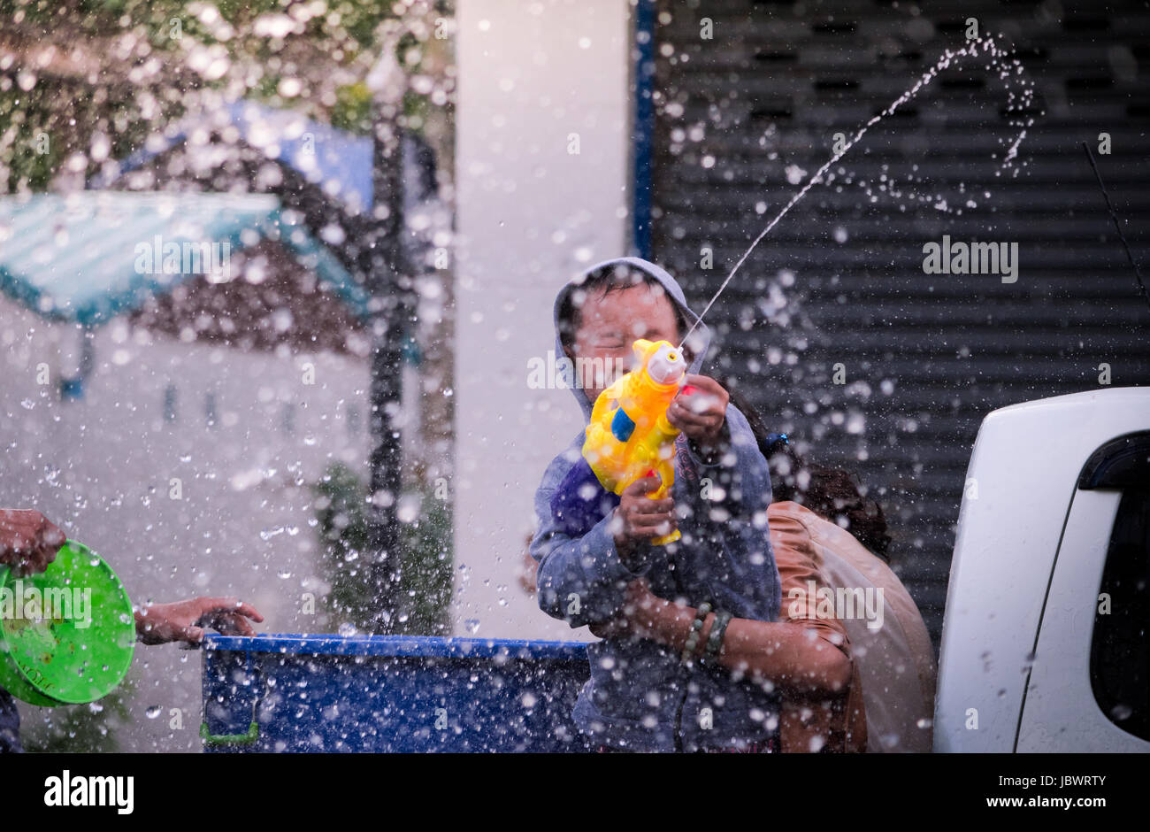 Boy in Songkran festival. Nakhon Ratchasima, Thailand. Stock Photo