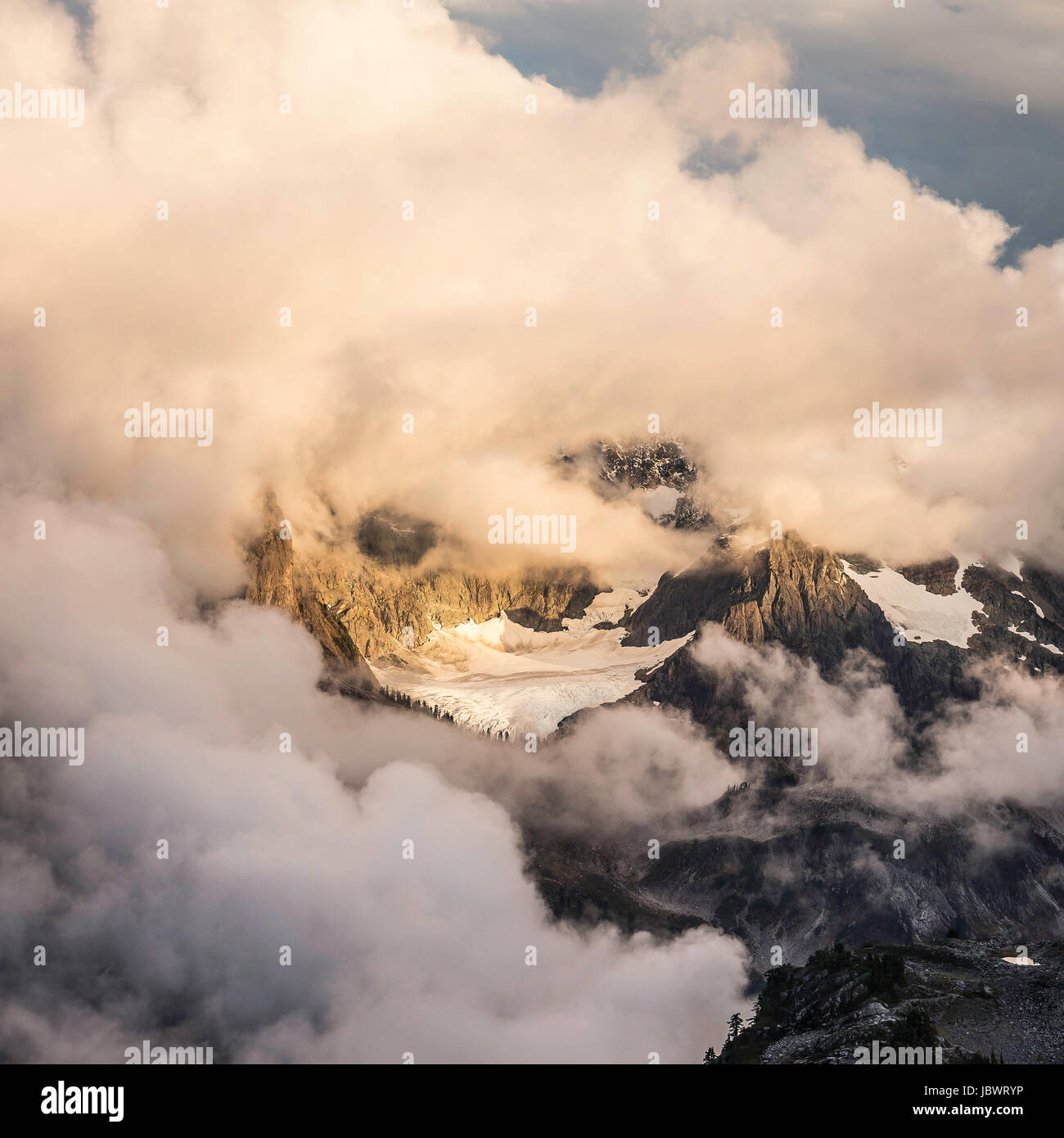 Mountain peak in clouds, Mount Baker, Washington, USA Stock Photo