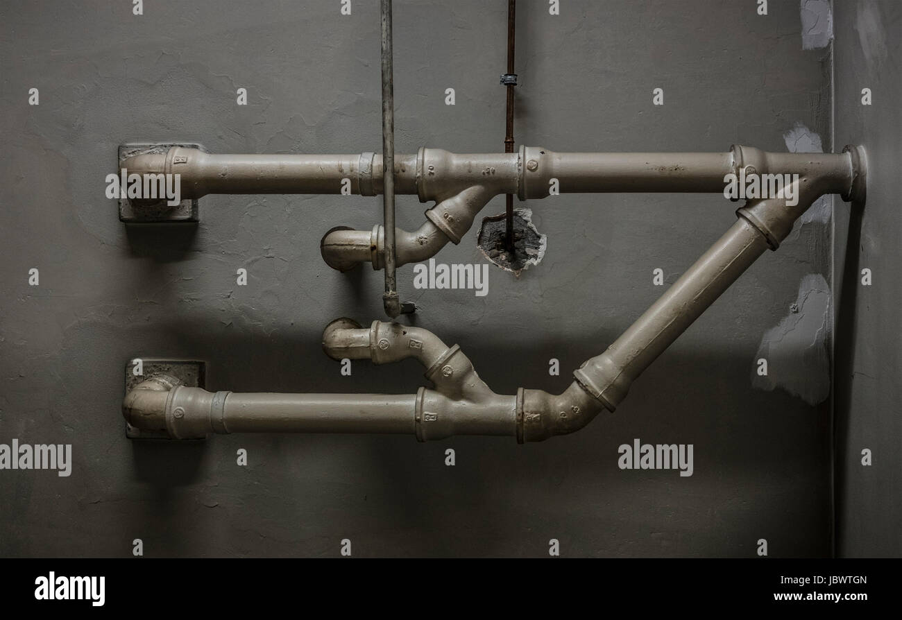 Industrial pipes on wall Stock Photo Alamy