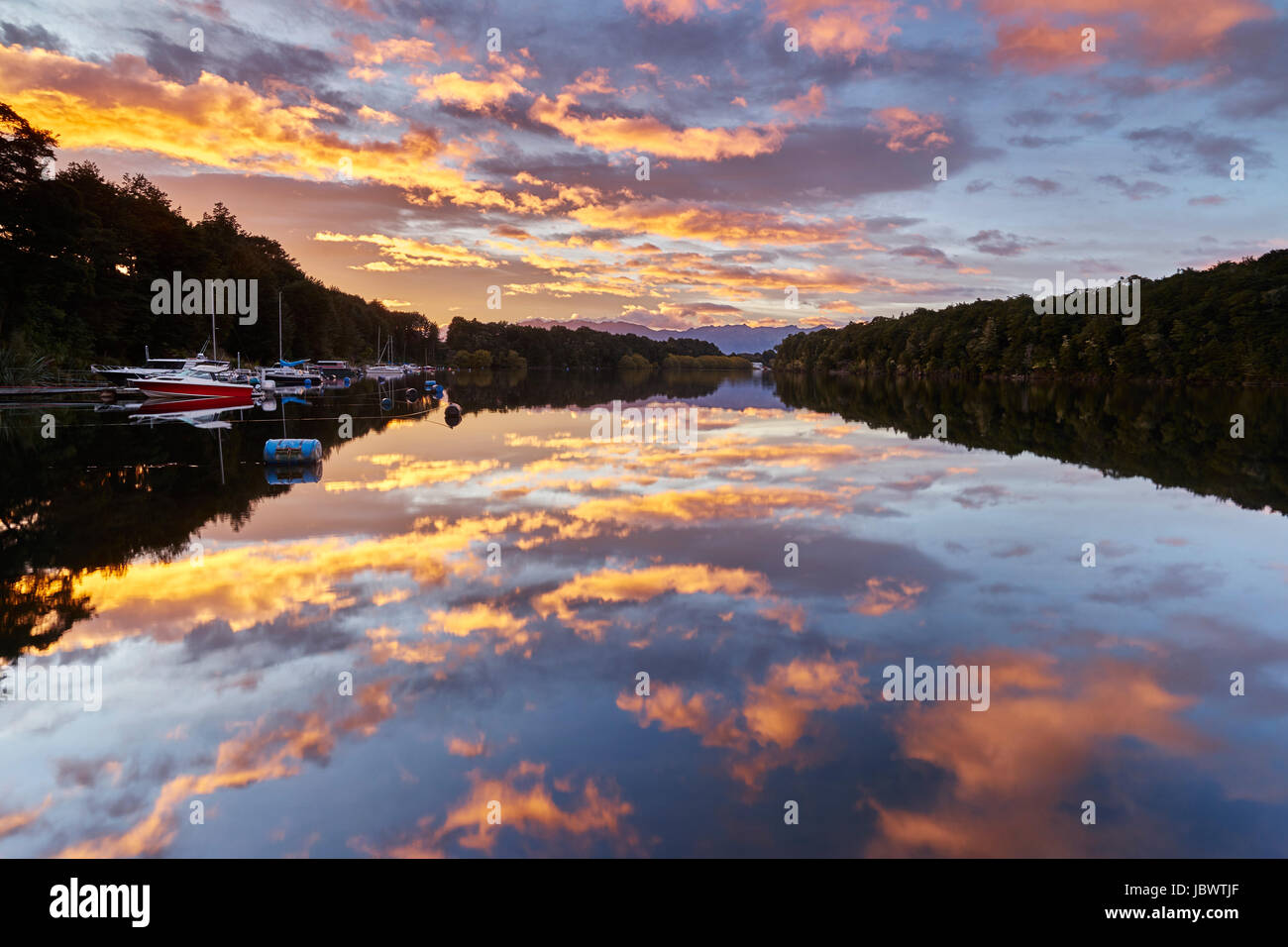 Sunset at Lake Manapouri, New Zealand Stock Photo - Alamy