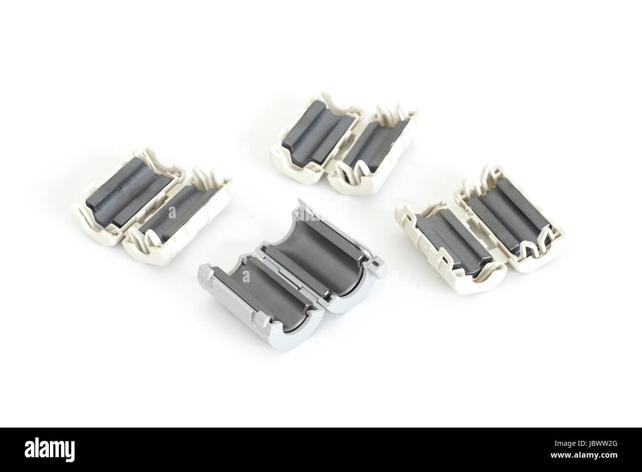 EMC, RFI and Noise reduction device - Ferrite Clamp or Clamp Filter Stock Photo