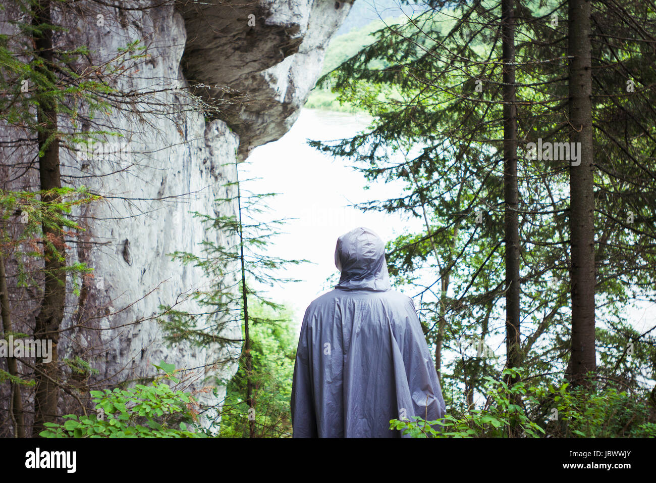 Person in raincoat, Koiva River, Perm Region, Russia Stock Photo