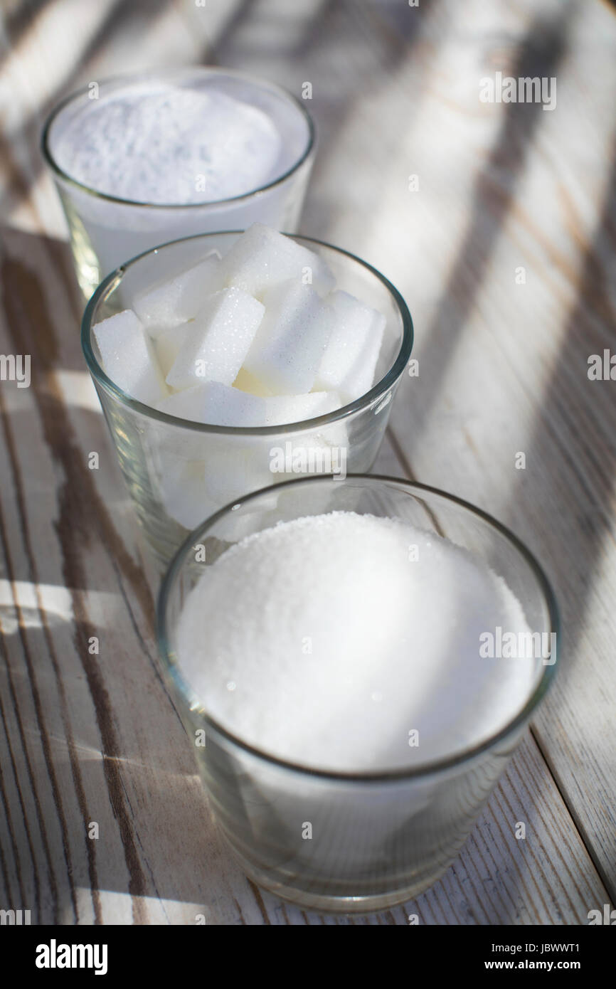 Glasses of sugar in various forms, closeup Stock Photo Alamy