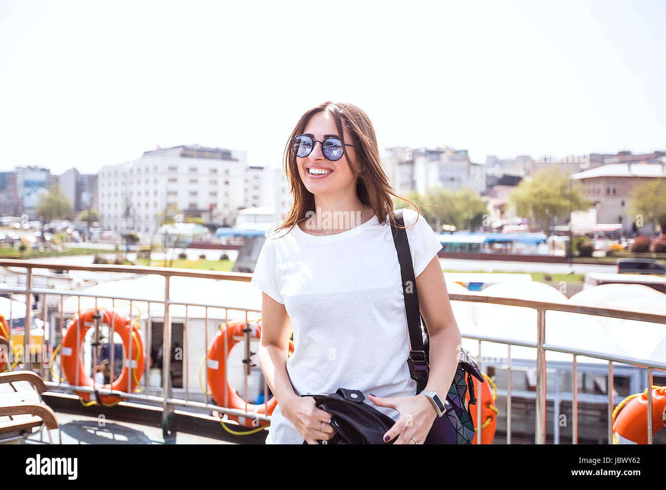 Female tourist wearing brown hi-res stock photography and images - Alamy