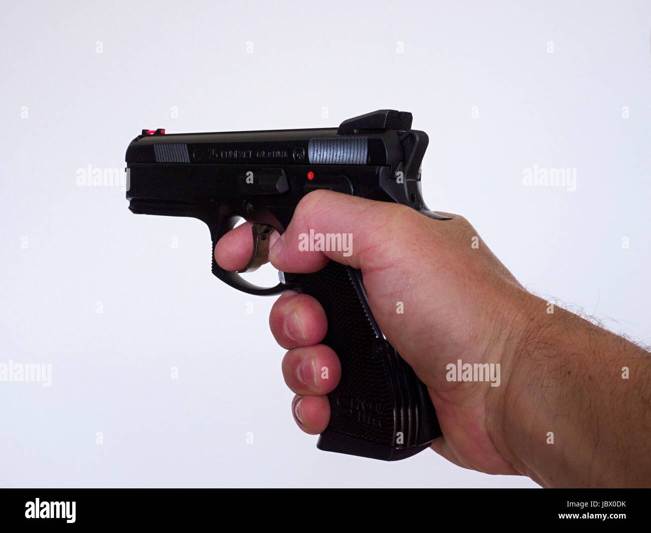 Pistol, hand, finger, trigger Stock Photo