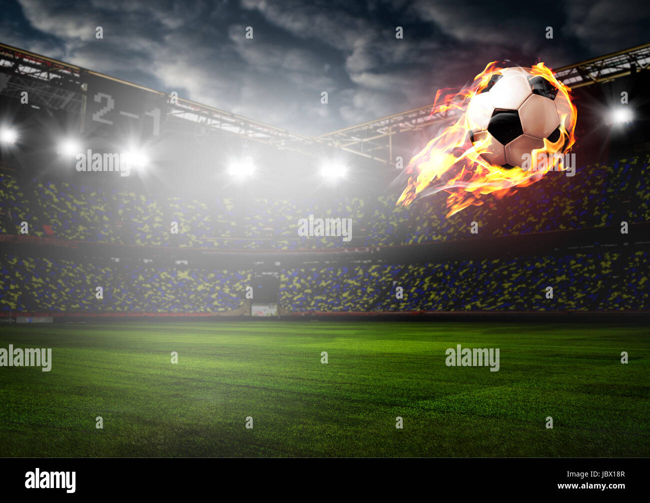 Burning soccer ball on stadium Stock Photo Alamy