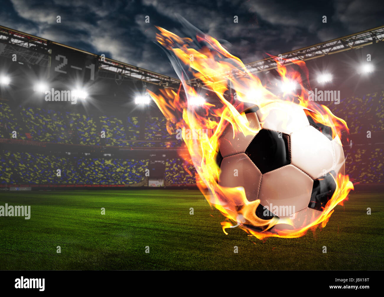 Burning soccer ball on stadium Stock Photo Alamy