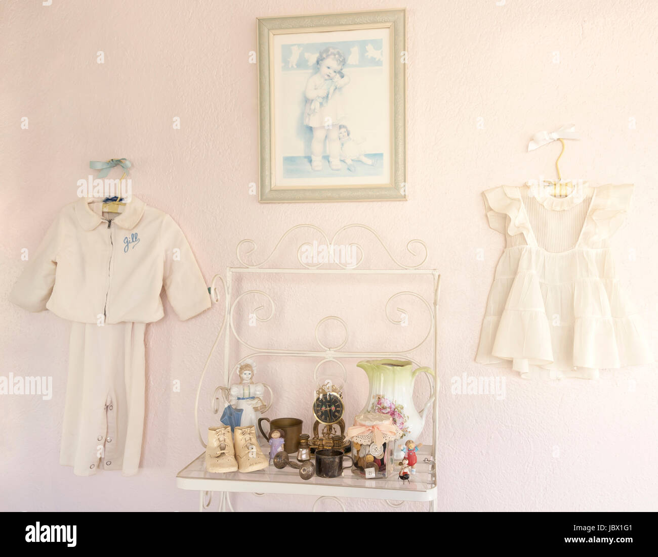 Displaying vintage child's clothing and memorabilia from the early 1950's. Stock Photo