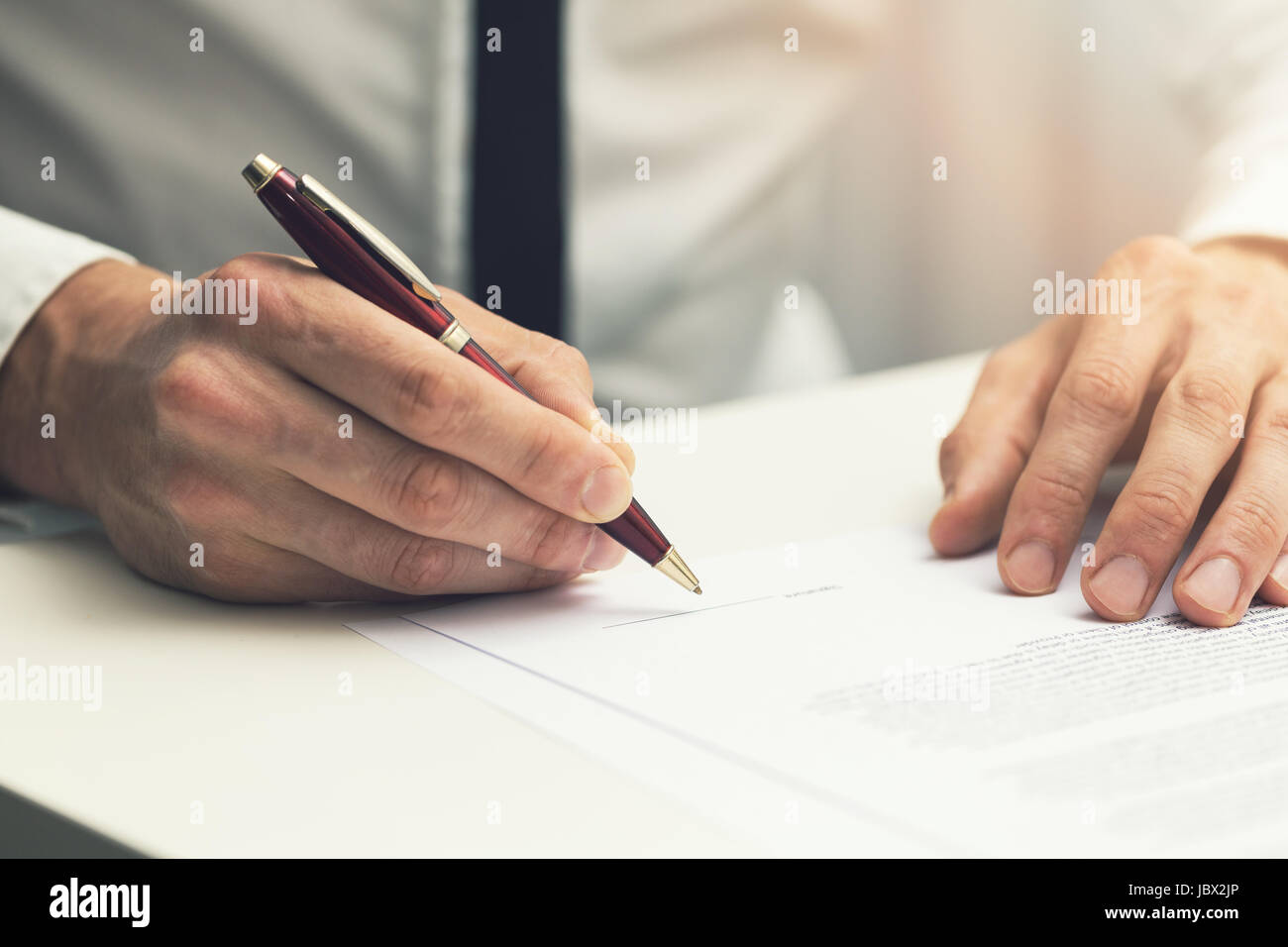 businessman signing business partnership contract Stock Photo