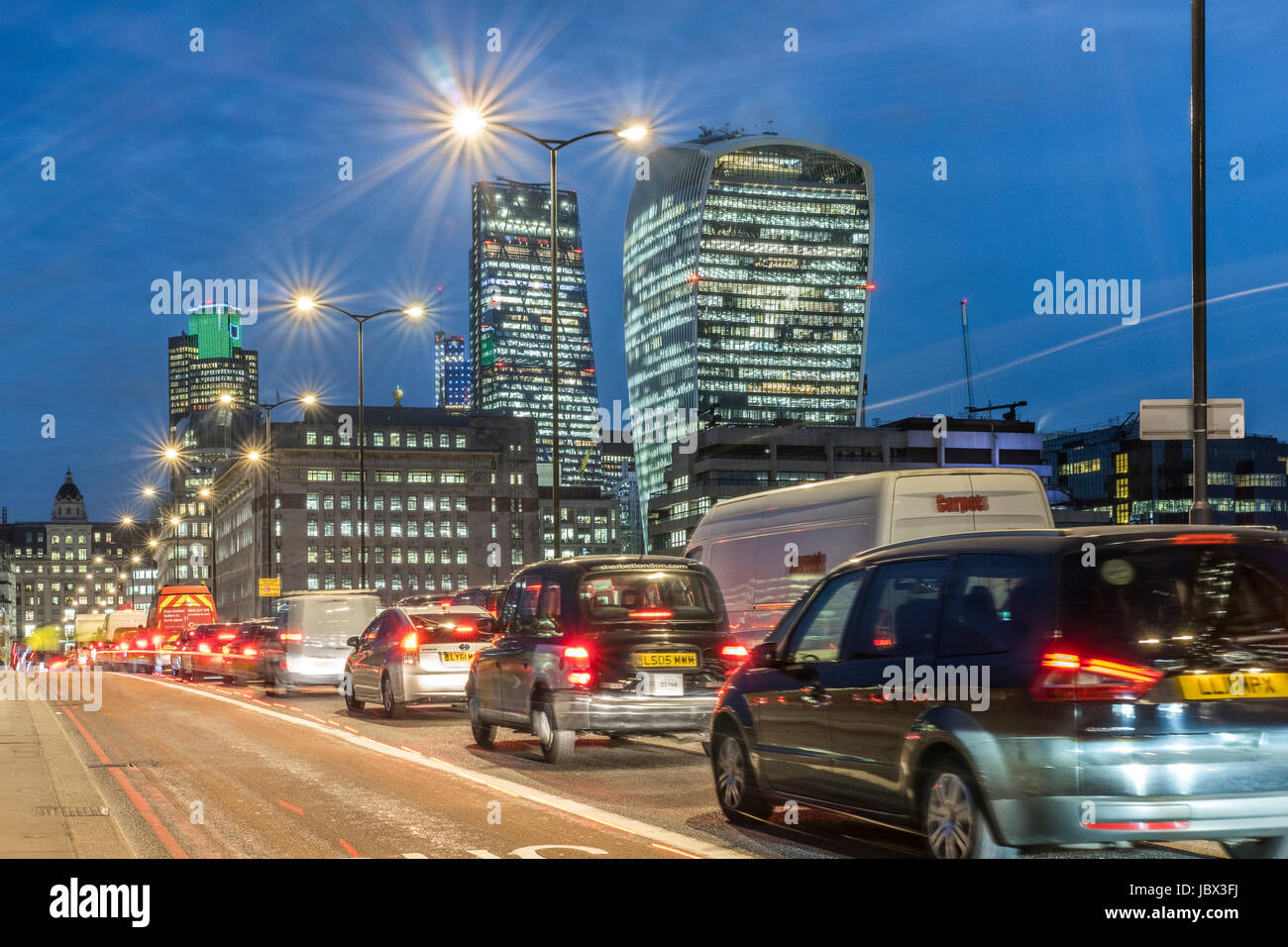 England, City of London-Heavy traffic on London Bridge Stock Photo