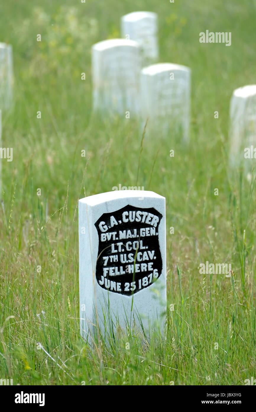 A head stone (black) marks the spot where General George Custer fell at Last Stand Hill during the Battle of Little Bighorn, Montana on July 25 1876. Stock Photo