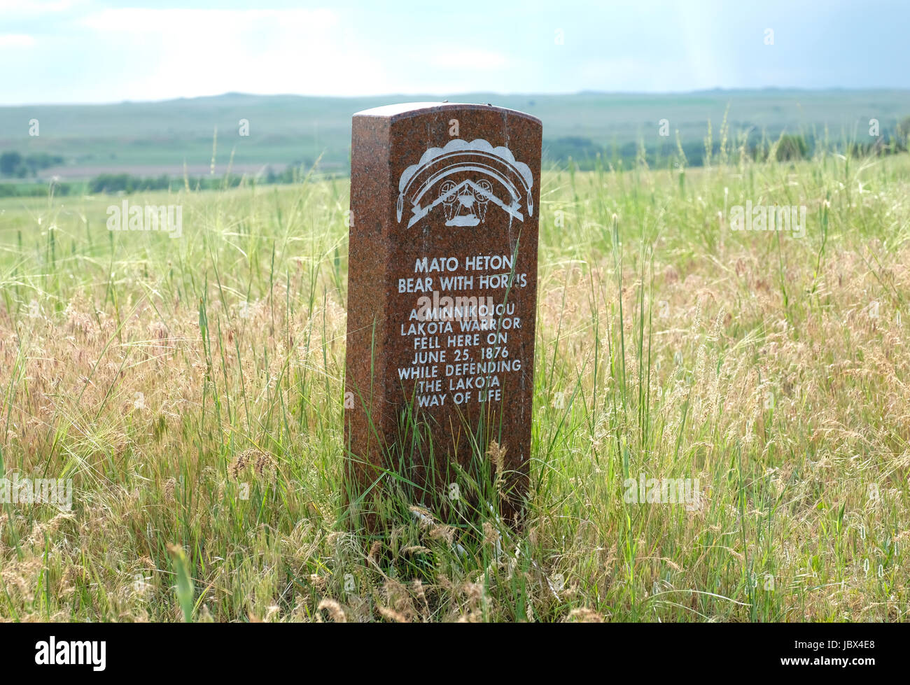 A head stone marks the spot where Lakota warrior, "Mato Heton" "Bear With Horns" fell during the battle of Little Bighorn, Montana in 1876. Stock Photo