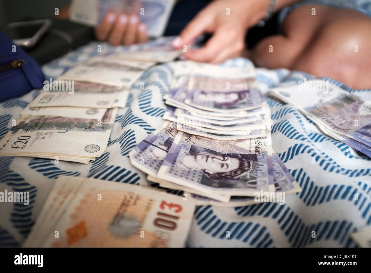 Counting money-UK pound sterling Stock Photo