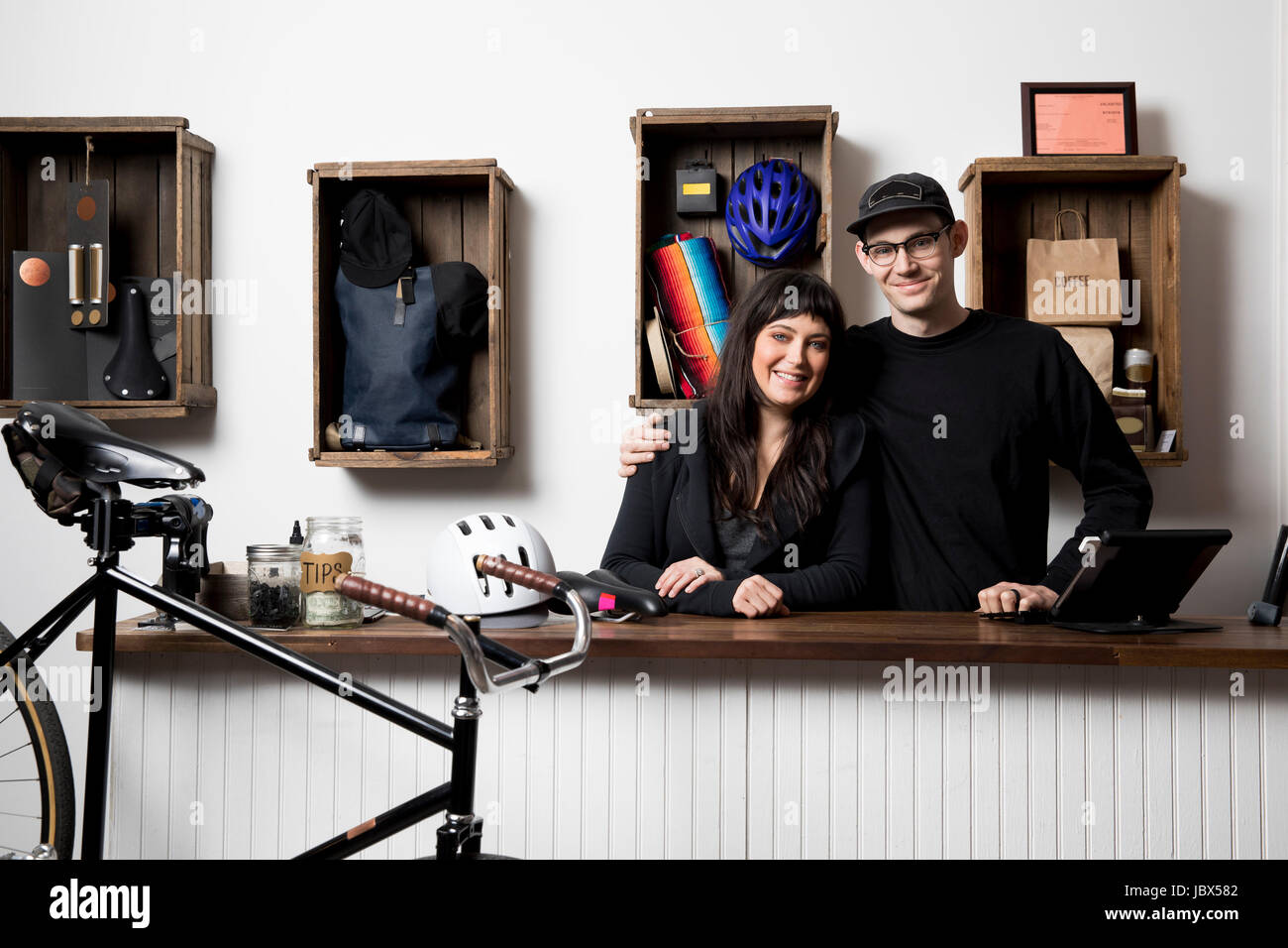 Couple in cycling accessories shop Stock Photo Alamy