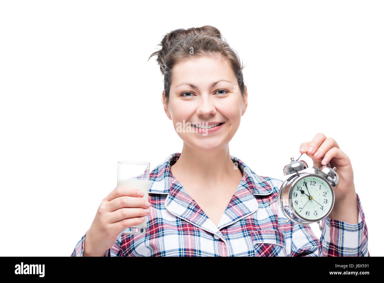 Healthy and beautiful woman drinks before bed, glass of milk, portrait