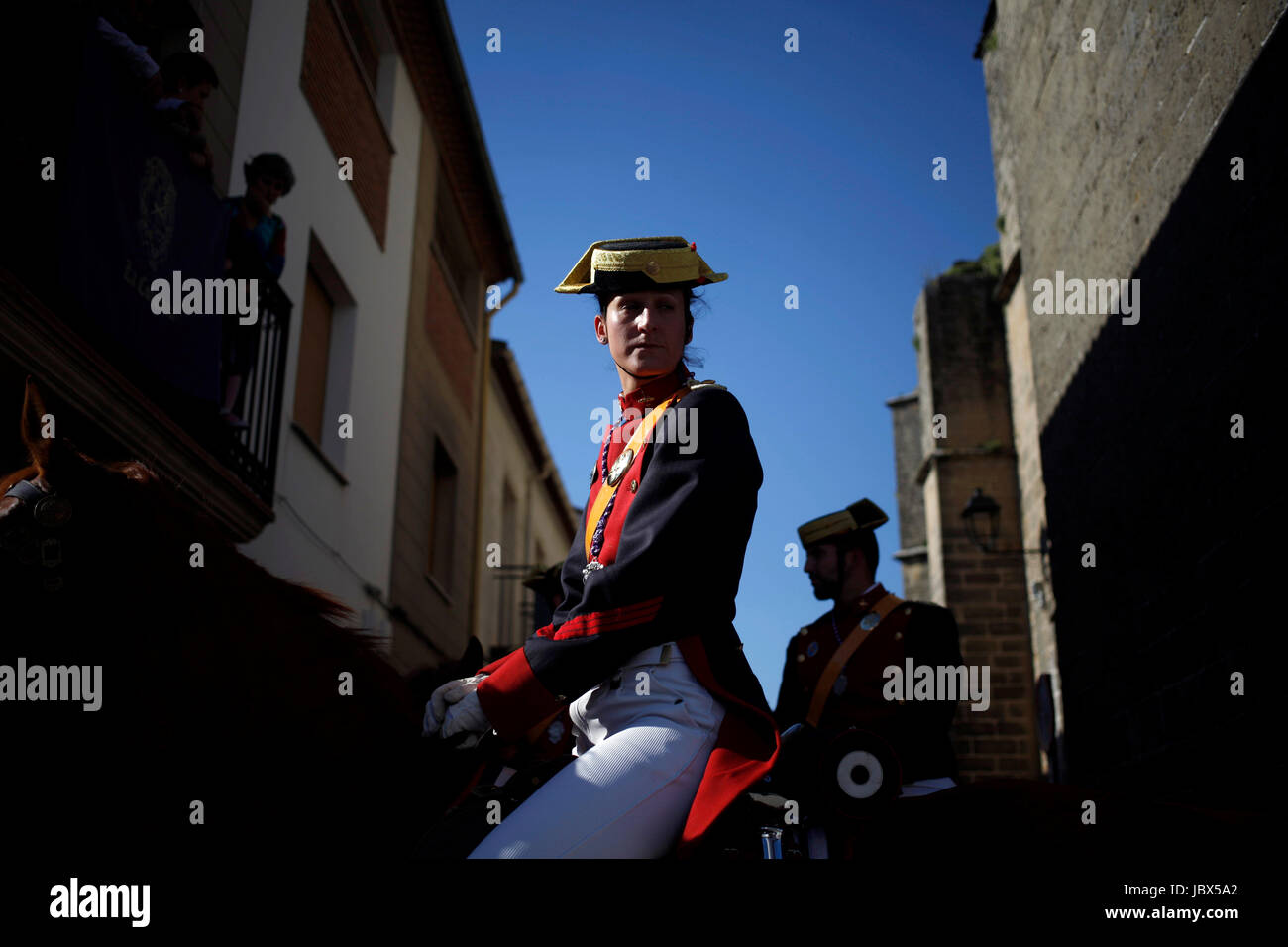 A female civil guard or guardia civil rides a horse during Easter Week celebrations in Baeza, Jaen Province, Andalusia, Spain Stock Photo