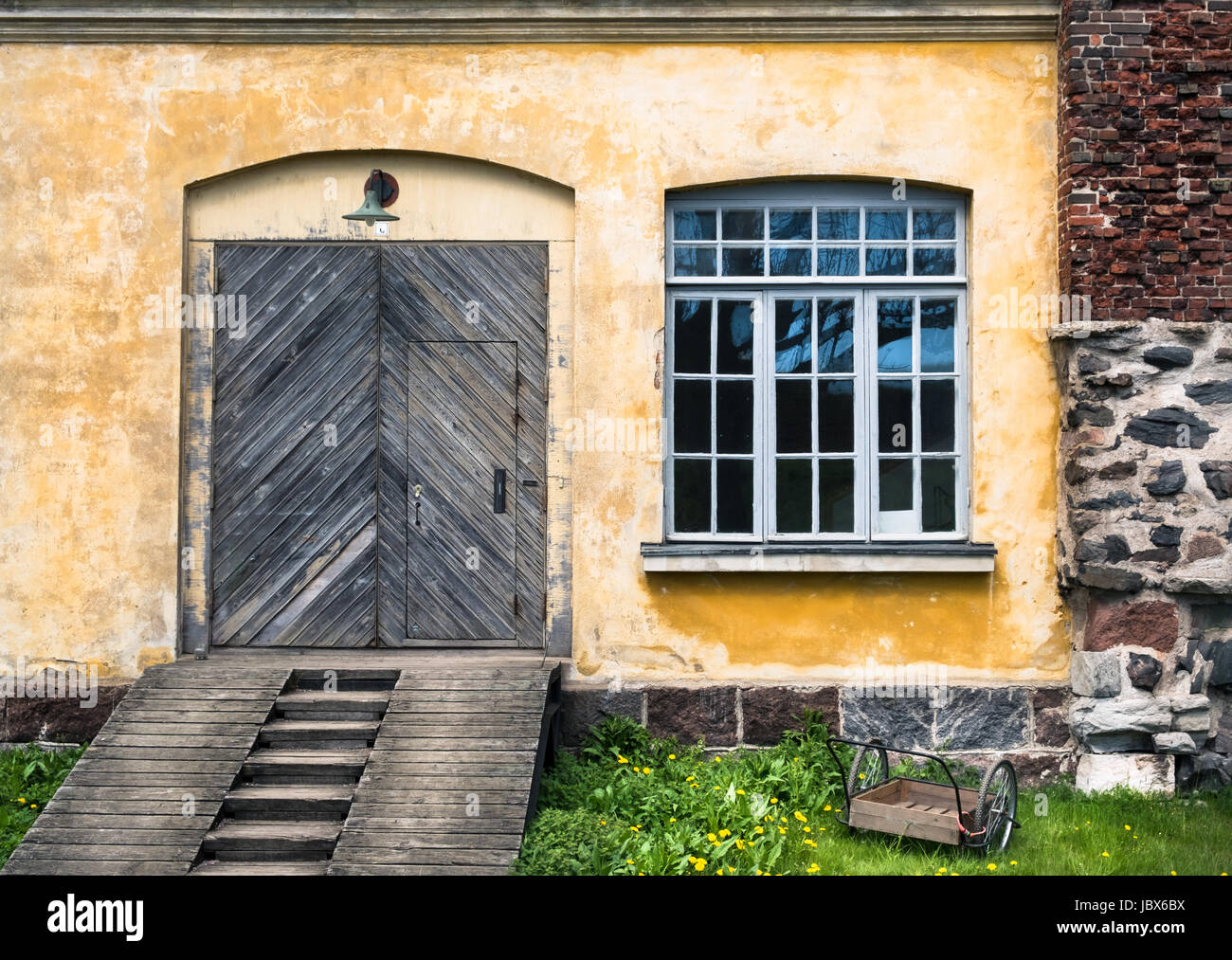 Some intresting views on old historical building with door and window in Suomenlinna (Sveaborg), Helsinki, Finland Stock Photo