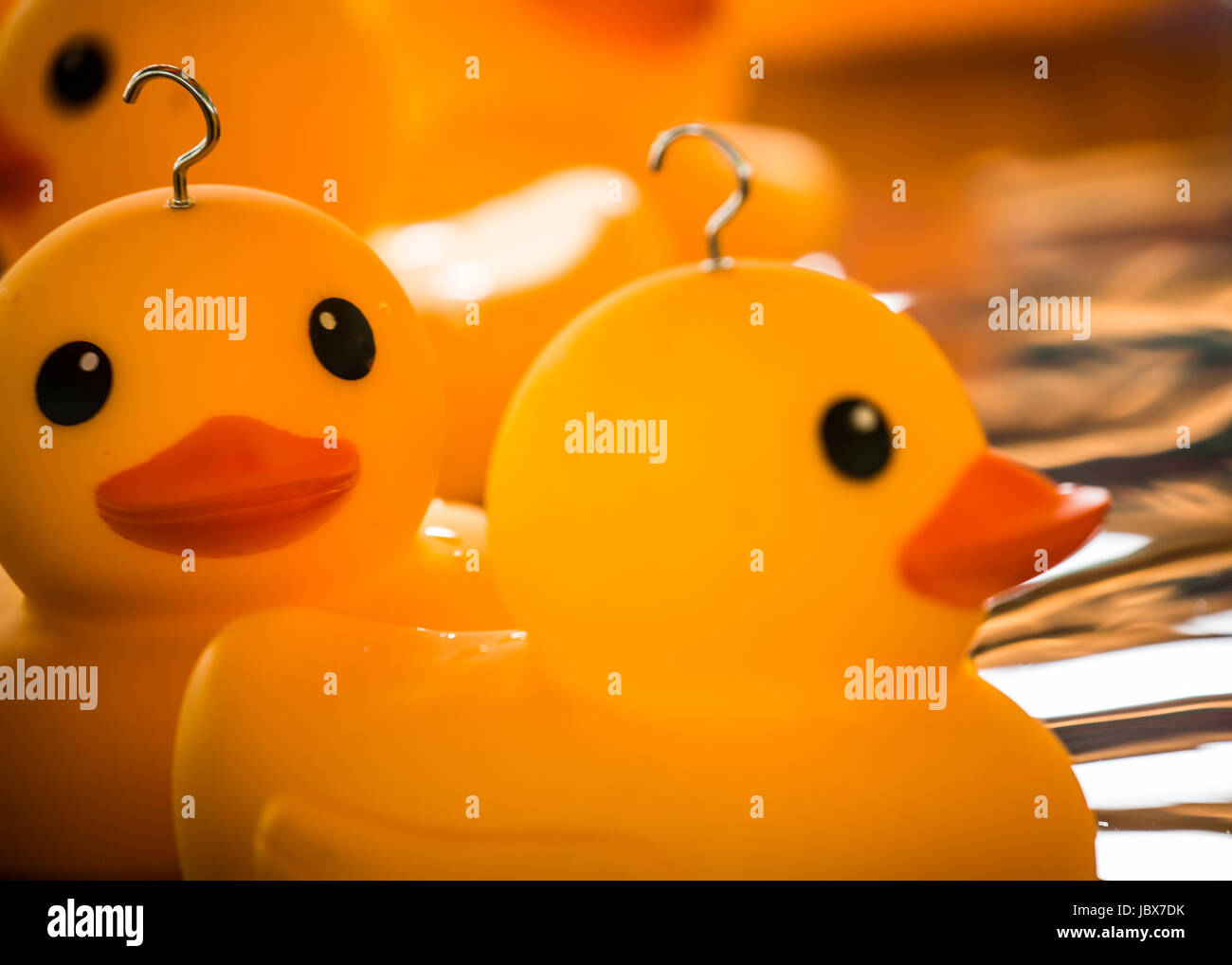 https://c8.alamy.com/comp/JBX7DK/plastic-ducks-from-a-childrens-hook-a-duck-game-at-kirtlington-feast-JBX7DK.jpg