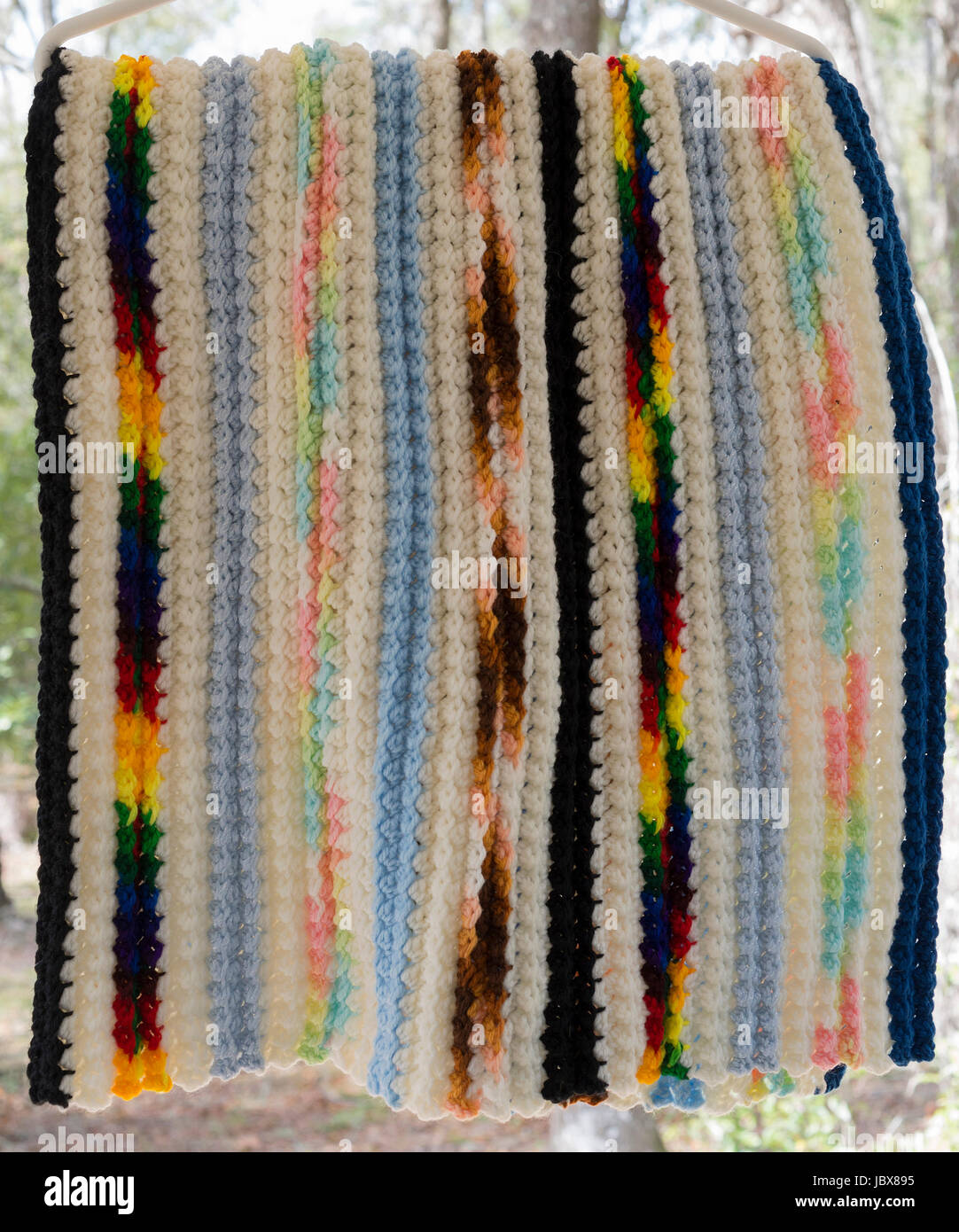 Colorful striped hand knitted throw cover Stock Photo Alamy