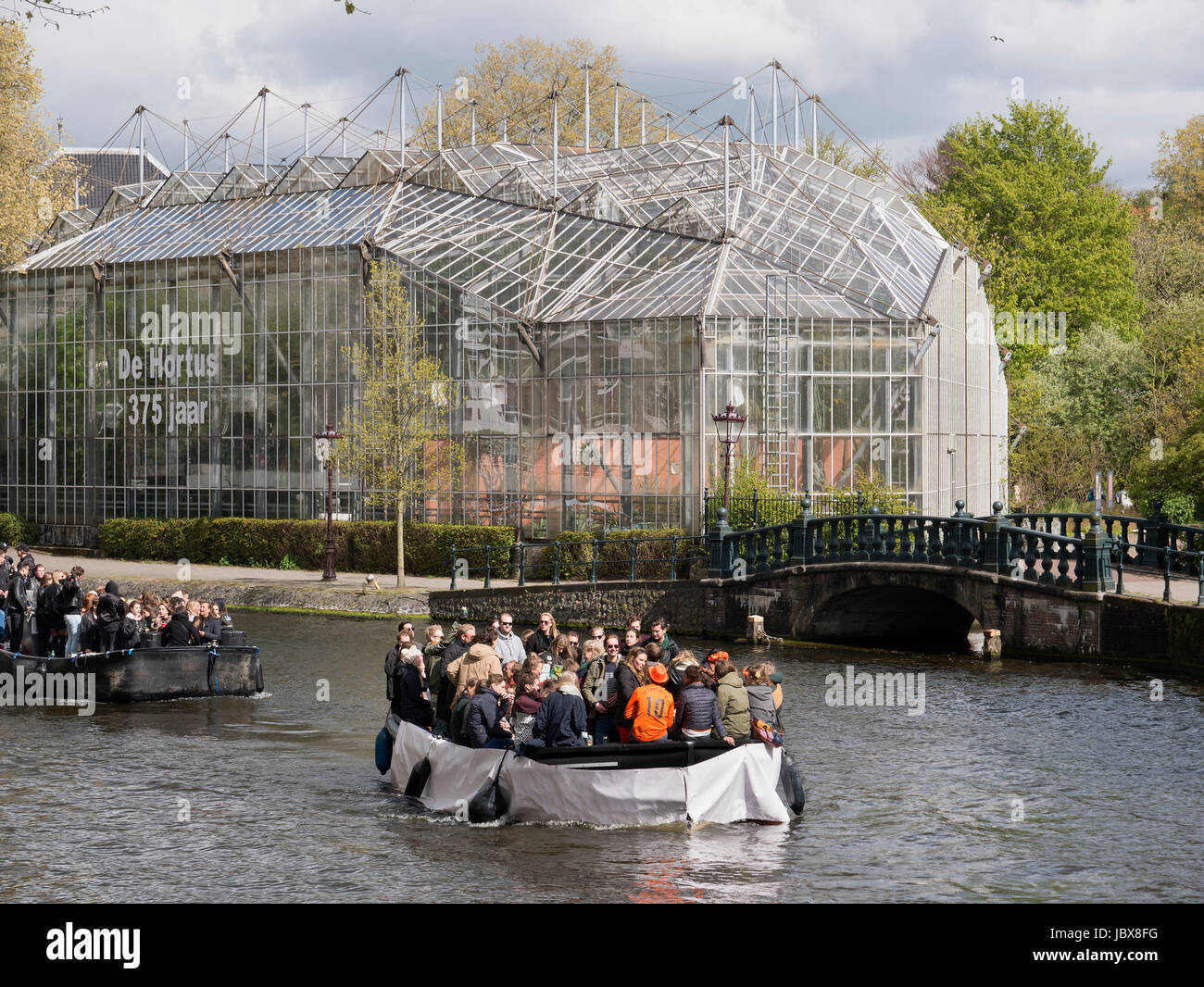 Botanical Garden And Boats On Nieuwe Herengracht On Kings Day