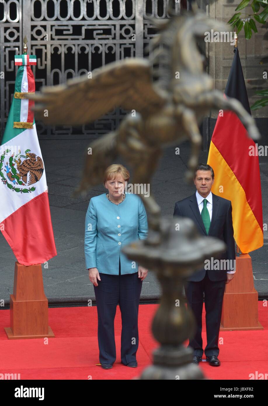 Mexican President Enrique Pena Nieto welcomes German Chancellor Angela Merkel to the National Palace at Los Pinos during the arrival ceremony June 9, 2017 in Mexico City, Mexico. Stock Photo