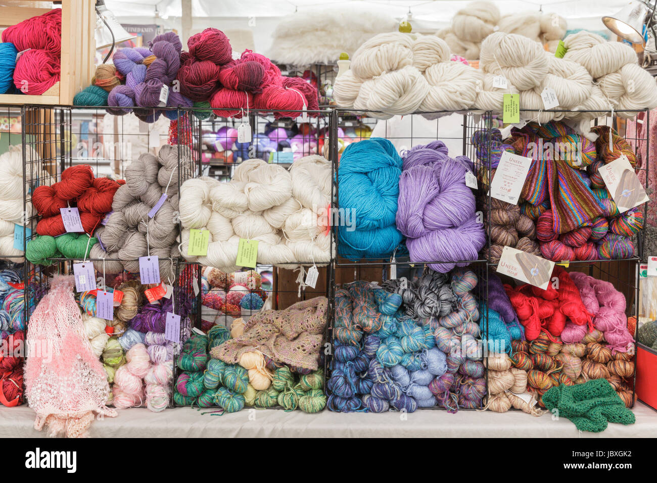 BOUCKVILLE, NY, USA - JUNE 10 2017: Skeins of merino wool and yak silk for sale at the annual Fiber Festival of Central New York. Stock Photo