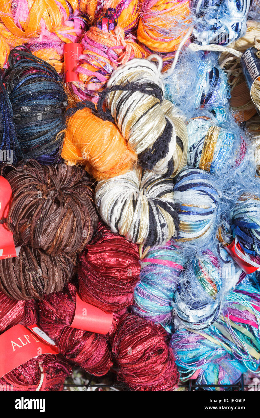 BOUCKVILLE, NY, USA - JUNE 10 2017: Merino and other types of wool skeins for sale at the annual Fiber Festival of Central New York. Stock Photo