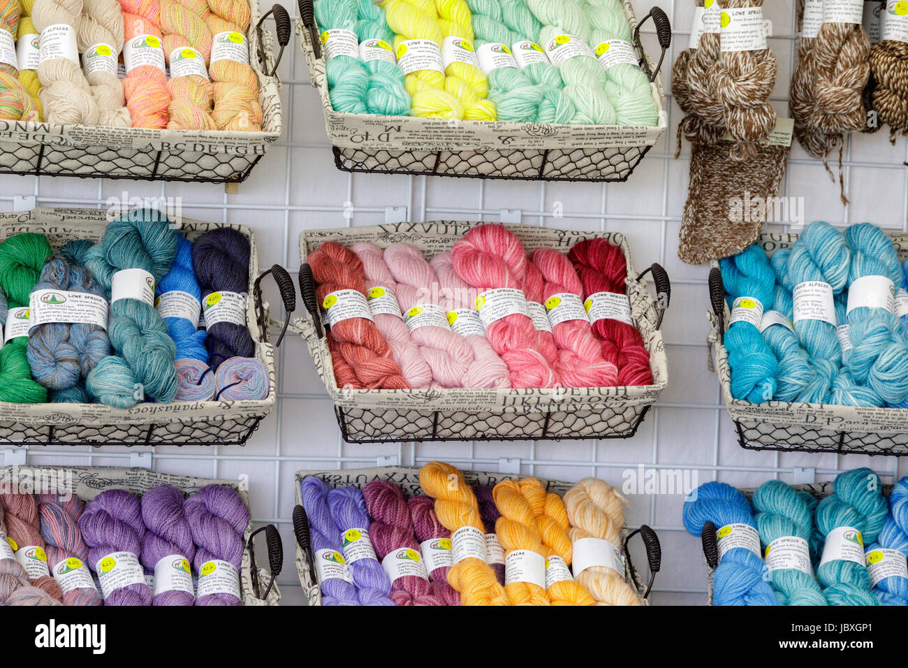 BOUCKVILLE, NY, USA - JUNE 10 2017: Alpaca wool skeins for sale at the annual Fiber Festival of Central New York. Stock Photo