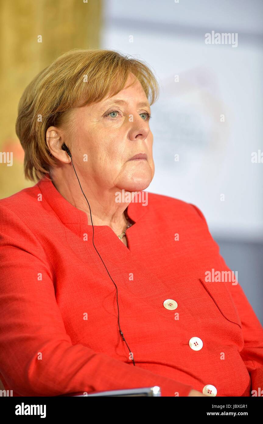 German Chancellor Angela Merkel listens to speakers during a meeting with Mexican business leaders at the Interactive Economics Museum June 10, 2017 in Mexico City, Mexico. Stock Photo