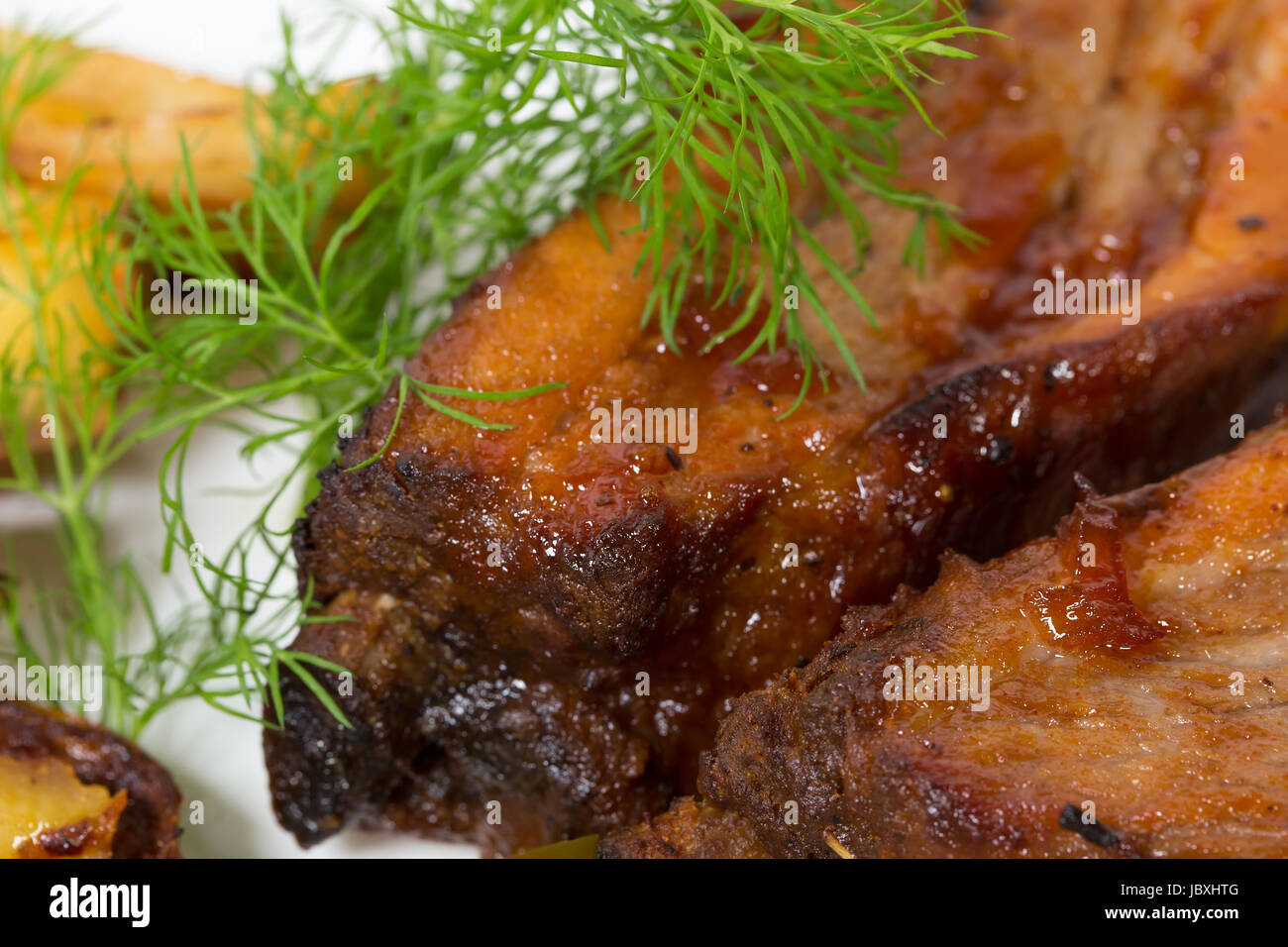 Roast pork ribs. Macro. Photo can be used as a whole background Stock