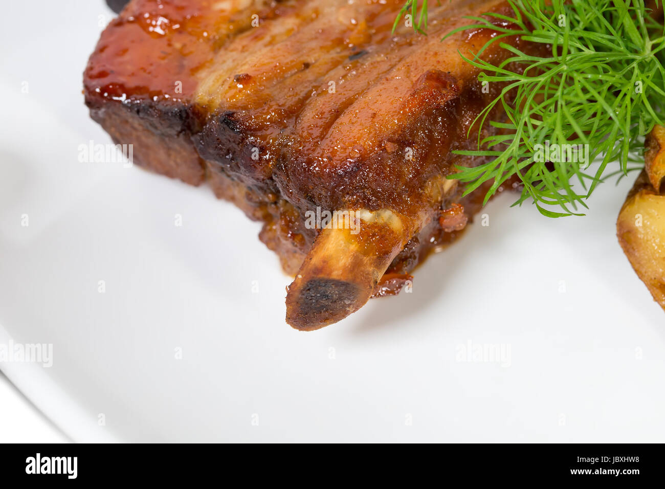 Roast pork ribs. Macro. Photo can be used as a whole background Stock
