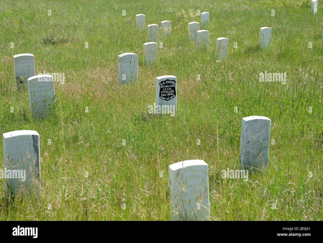 A head stone (black) marks the spot where General George Custer fell at Last Stand Hill during the Battle of Little Bighorn, Montana on July 25 1876. Stock Photo