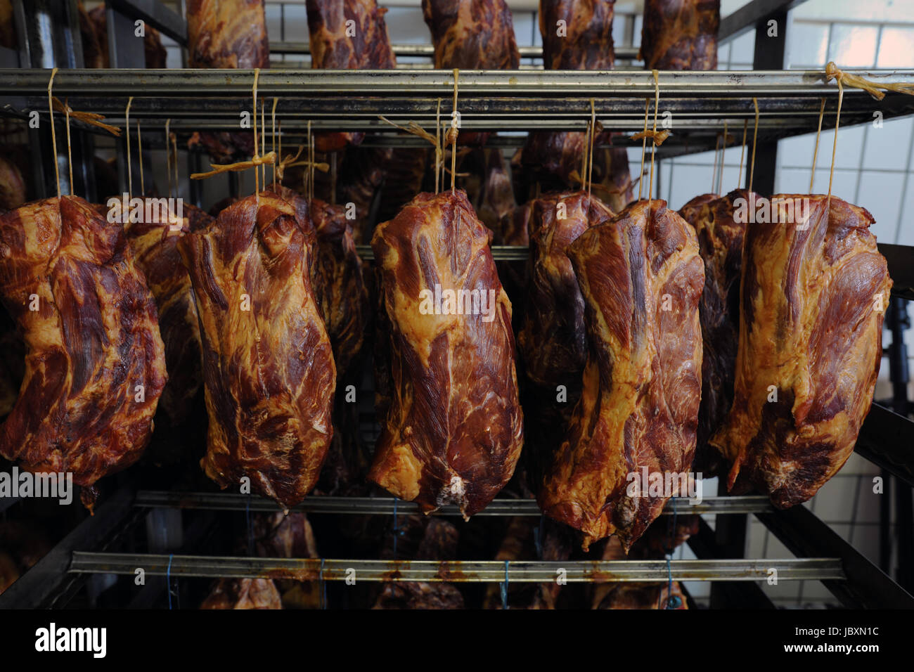 smoked meat at the butchery Stock Photo Alamy
