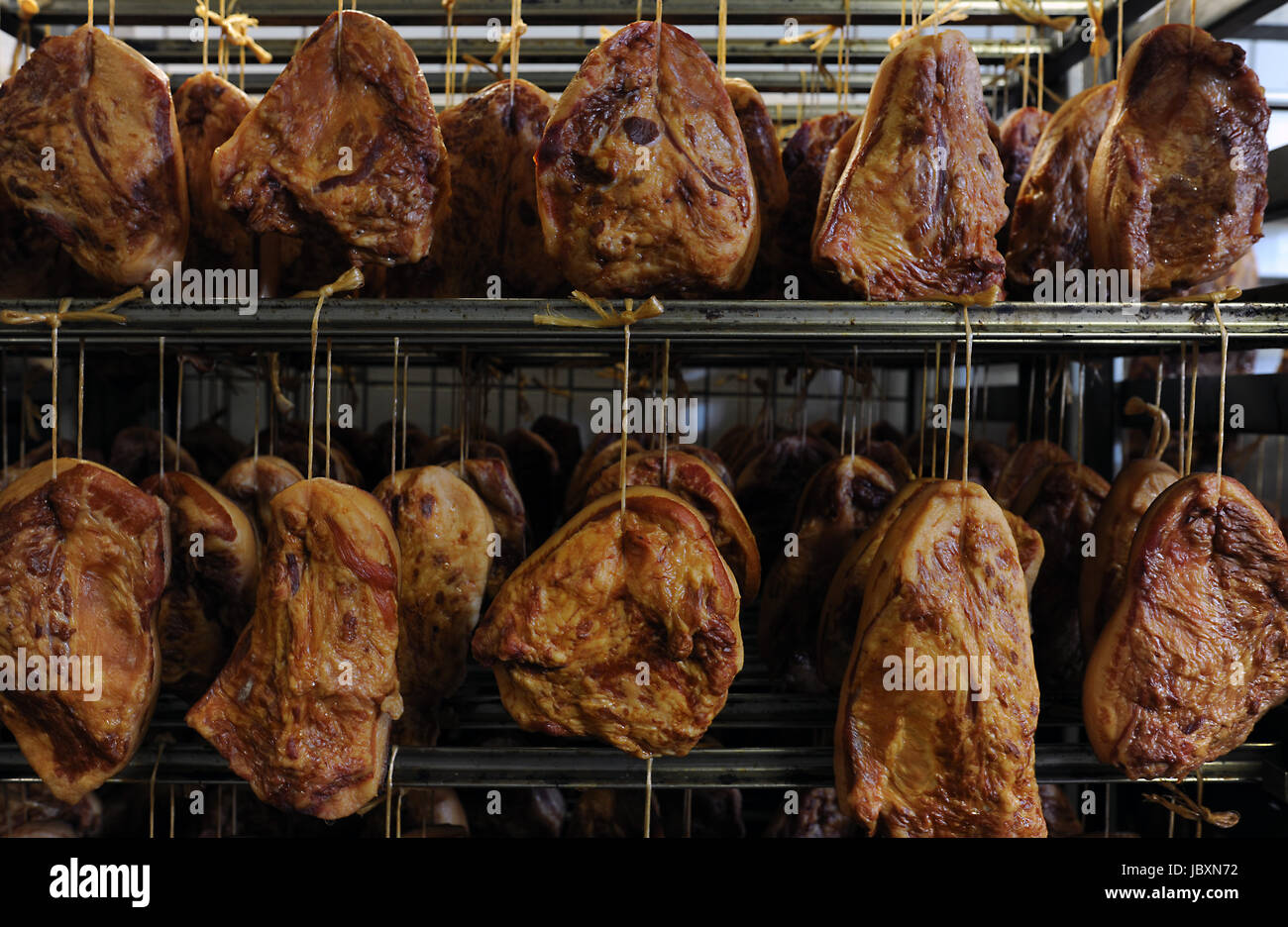 smoked meat at the butchery Stock Photo Alamy