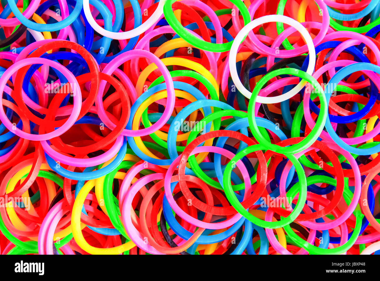 Colorful background Rainbow loom rubber bands fashion Stock Photo by  ©Havanaman 49109435