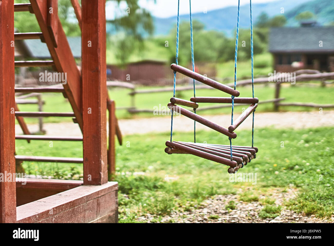 Wooden equipment on kinds playground Stock Photo Alamy