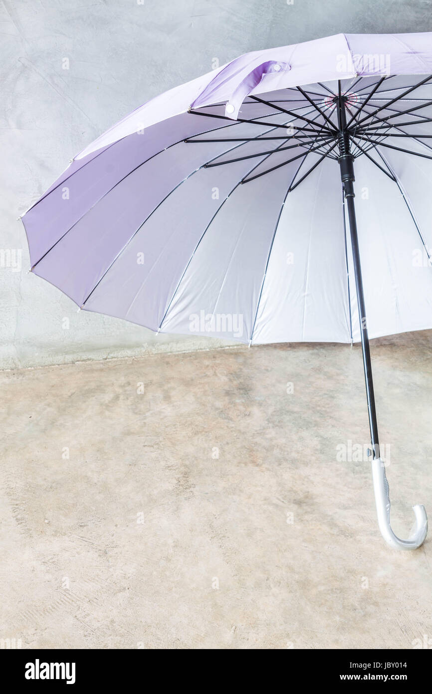 Violet Silver Bronze Uv Protection Umbrella On The Floor Stock